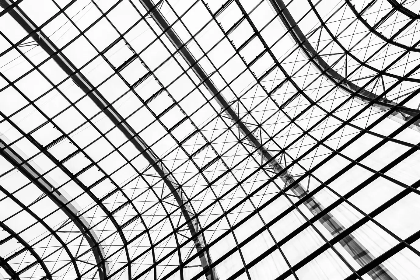 Abstract exterior architecture with a glass window roof.