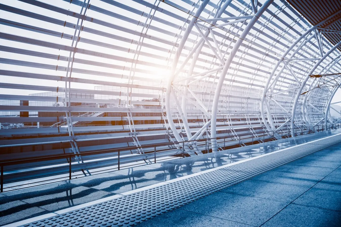 An empty corridor in a modern airport.